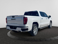 The All New GMC Sierra has been redefined from Hood to Hitch. This 4WD White Sierra is a Crew Cab Pi... (image 4)
