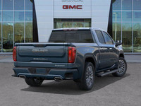 The 2025 GMC Sierra 1500 Denali Ultimate, finished in Downpour Metallic with a refined Alpine Umber... (image 7)