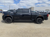 Forged to tackle the mightiest of tasks, the 2022 GMC Sierra 3500HD Denali, with its Ebony Twilight... (image 4)