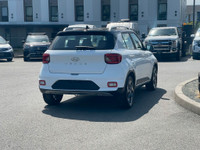 This 2021 Hyundai Venue has a White exterior and Black seats with seating for 5. Equipped with a1.6... (image 6)