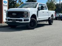 This 2023 Ford F-350 XLT has an Oxford White exterior and Medium Dark Interior with seating for 5. E... (image 1)