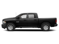 The 2021 Ram 1500 Classic Express 4x4 Crew Cab 57 Box is a bold black truck with an impressive 44 dr... (image 4)