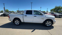 This Ram 1500 Classic is equipped with: Cloth Front 40/20/40 Bench Seat, Remote Start, Radio: Uconne... (image 3)