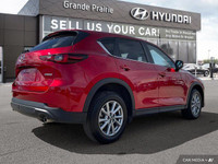 Experience the thrill of confident driving with this 2025 Mazda CX-5 PREF, boasting a sleek red exte... (image 5)