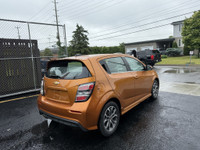 ONE OWNER This 2017 Chevrolet Sonic LT Auto 4dr Hatchback in vibrant orange is sure to turn heads! W... (image 2)