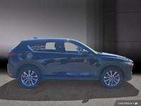 Le Mazda CX-5 GT Turbo 2021 est un VUS compact qui allie élégance, performance et raffinement. Propu... (image 7)
