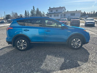 The 2017 Toyota RAV4 Hybrid XLE in a stunning blue finish offers exceptional control with its AWD dr... (image 5)