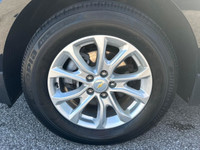 The 2019 Chevrolet Equinox LT in a classic color merges the convenience of an SUV with the agility o... (image 3)