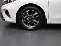 Experience refined performance and modern comfort with the 2024 Kia Forte 5 EXâ€”a sleek, sporty hat... (image 3)