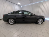 Audi's 2013 A6 3.0 Premium quattro Sedan looks sharp in Brilliant Black. Powered by a SuperCharged 3... (image 8)