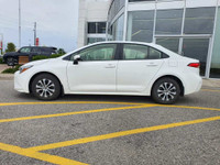 Check out this 2023 Toyota Corolla Hybrid LE CVT with 27,670 KMS, finished in a sleek White exterior... (image 3)