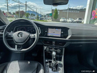 This Volkswagen Jetta boasts a Intercooled Turbo Regular Unleaded I-4 1.4 L/85 engine powering this... (image 9)