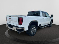 This 2025 GMC Sierra 2500HD in Summit White is equipped with 4WD and Turbocharged Diesel V8 6.6L/ en... (image 4)