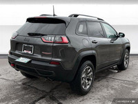 Powered by a 3.2-liter V6 engine, the Cherokee Trailhawk offers impressive power and off-road capabi... (image 5)