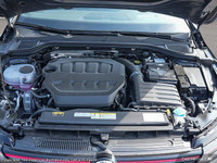 The 2025 Volkswagen Golf GTI in a striking white finish is a front-wheel-drive dynamo engineered to... (image 5)
