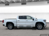 The 2024 GMC Sierra includes four-wheel drive, LED headlights, and an integrated tailgate step. Insi... (image 6)