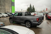 This 2019 Honda Ridgeline Touring brings together rugged capability, refined comfort, and advanced t... (image 2)