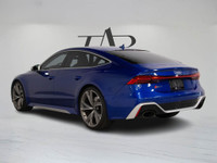 This 2022 Audi RS 7 in striking blue is a Canadian vehicle with a clean Carfax and remaining factory... (image 4)