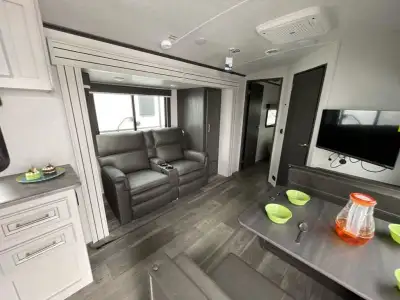 Keystone Cougar Half-Ton travel trailer 24SABWE highlights: Dual Entry Master Suite Rear Kitchen Pas...