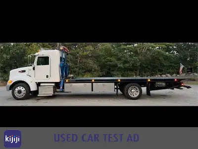 Free Winter tires with all purchases! 2017 PETERBILT 330 ROLLBACK TOW TRUCK WITH SIDE PULLER, 79,200...