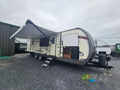 A front kitchen, dual entry, a custom king bed, and double slides are just a few of the features tha...