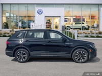 This Volkswagen Tiguan delivers a Intercooled Turbo Regular Unleaded I-4 2.0 L/121 engine powering t... (image 5)