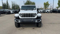 This 2025 JEEP WRANGLER 4-DOOR SAHARA has the following options Cloth Low-Back Bucket Seats, Remote... (image 3)