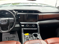 Experience power and luxury in the GMC Sierra 2500HD Denali Ultimate, painted in an eye-catching col... (image 5)