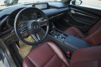 This 2023 Mazda MAZDA3 GT AWD is a sleek and stylish hatchback with a stunning red interior that's s... (image 8)