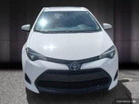 La Toyota Corolla 2018 est une berline compacte reconnue pour sa fiabilité, son efficacité énergétiq... (image 9)
