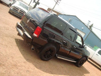 NORTH POINT MOTORS...CALL TEXT 780-224-7791 CHECK OUT THIS 05 CADILLAC ESCALADE AWD 6.0L V8. TRUCK I... (image 2)