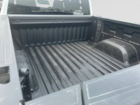 This 2025 GMC Sierra 1500 in Summit White is equipped with 4WD and Gas V8 5.3L/325 engine. The Next... (image 9)