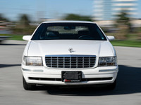 1997 Cadillac Deville White Exterior on blue Interior comes with Leather seats , Heated seats , Digi... (image 1)