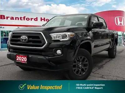 Conquer any terrain with this 2020 Toyota Tacoma Crew Cab Pickup, boasting a rugged Magnetic Grey Me...