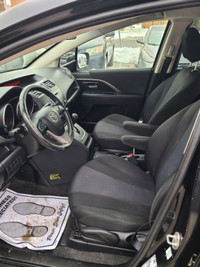 This stylish 2016 Mazda MAZDA5 Touring is a reliable and spacious wagon that's perfect for your dail... (image 6)
