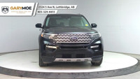 The 2024 Ford Explorer Limited 4WD in sleek black is a robust yet stylish SUV designed to conquer bo... (image 7)