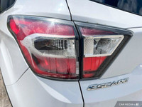 This Ford Escape boasts a Intercooled Turbo Regular Unleaded I-4 1.5 L/91 engine powering this Autom... (image 9)