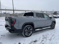 The 2025 GMC Sierra EV Denali in Thunderstorm Grey is an electric revolution. Its sleek and modern d... (image 7)