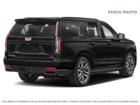 The 2022 Cadillac Escalade Sport in Crystal White Tricoat delivers a bold and refined presence, enha... (image 4)