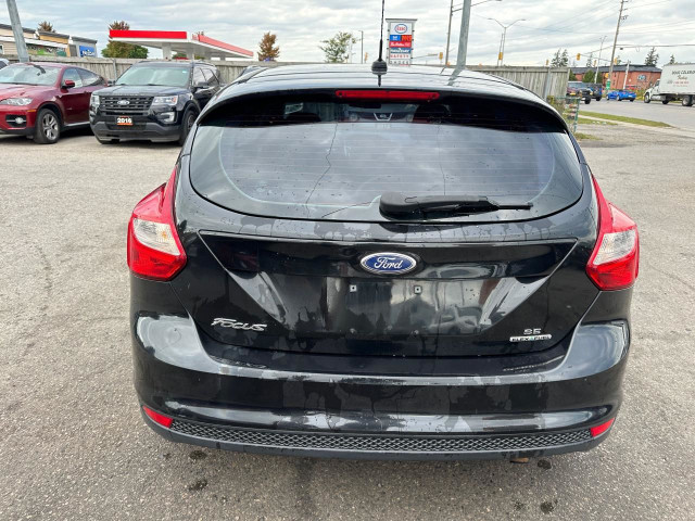 2014 Ford Focus AS IS, SE, POSSIBLE TRANSMISSION ISSUE, RUNS in Cars & Trucks in London - Image 4