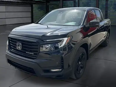 A rugged yet refined crew cab pickup with all-wheel drive and a 5.25 ft. box. The Black Edition incl...