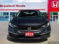 This 2019 Honda Civic Sedan EX boasts a stunning Cosmic Blue Metallic exterior and a sleek black fab... (image 8)