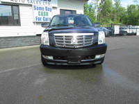 2011 Cadillac Escalade AWD with 234,285km! Equipped with remote keyless entry, power windows, power... (image 1)