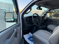 2025 CHEVROLET EXPRESS G3500 LT - 12 Passenger - 6.6 Lit - 8 Cylinder Gasoline engine. White exterio... (image 1)