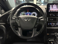 The 2024 Infiniti QX80 Luxe is a powerful and refined SUV, driven by a 5.6L premium engine that deli... (image 7)