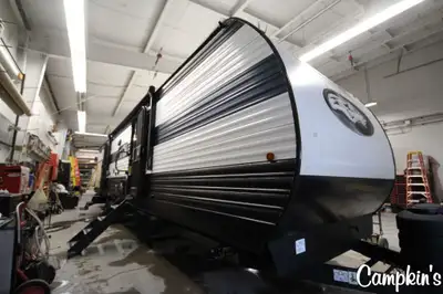 Check out the Cherokee 324TS. This triple slide floorplan maximizes storage, sleeping capacity, and...