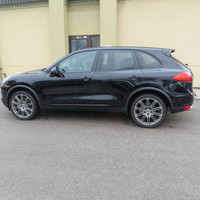 This 2011 Porsche Cayenne is a sleek and powerful SUV that's sure to turn heads. With its black exte... (image 6)