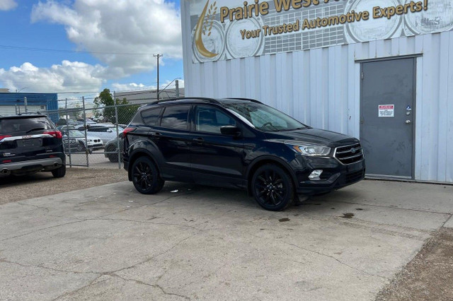 2019 Ford Escape SE 4WD - 2nd Seat of Tire in Cars & Trucks in Saskatoon - Image 4