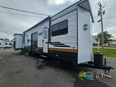 Forest River Wildwood Lodge destination trailer 42QBQ highlights: Spacious Bunkhouse Suite Queen Bed...