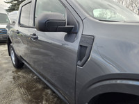 This brand new CARBONIZED GREY METALLIC 2025 FORD MAVERICK XL is powered by a 2.0L ECOBOOST ENGINE T... (image 4)